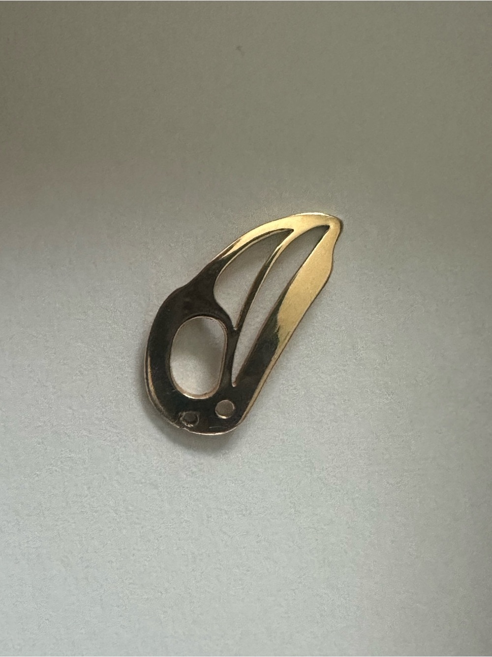 Valerie Malesku 14k gold pendant. Pacific Northwest First People Raven. Signed.